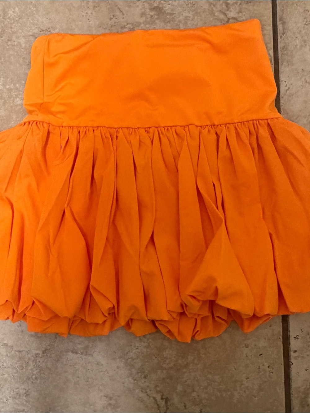 Orange bubble skirt with elastic drop waist.  Never worn, NWOT. Size Small.